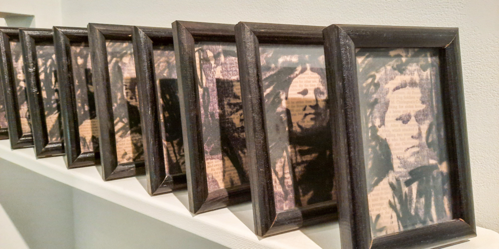 Rez Girls (Detail) Transparency photo print and book pages in frames on shelf. 15 x 10 cm (each image). 1998. Dimensions variable. Collection of the University of Saskatchewan.